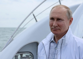 Russian President Vladimir Putin looks on during a boat trip with his Belarusian counterpart Alexander Lukashenko off the Black Sea coast, Russia May 29, 2021. Sputnik/Sergei Ilyin/Kremlin via REUTERS ATTENTION EDITORS - THIS IMAGE WAS PROVIDED BY A THIRD PARTY.