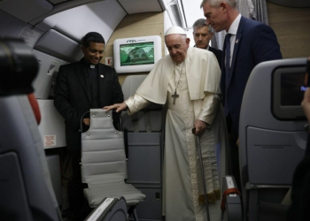 epa10098163 Pope Francis holds a news conference aboard the papal plane on his flight back after visiting Canada, 30 July 2022.  EPA/GUGLIELMO MANGIAPANE / POOL